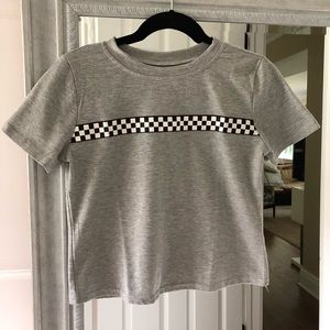 Grey T-shirt with black and white patter across